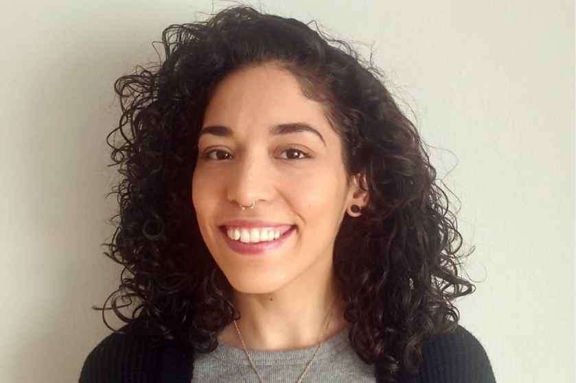 A portrait shows Fernanda Marroquin smiling at the camera.